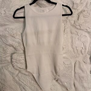Elegant White Ribbed Bodysuit